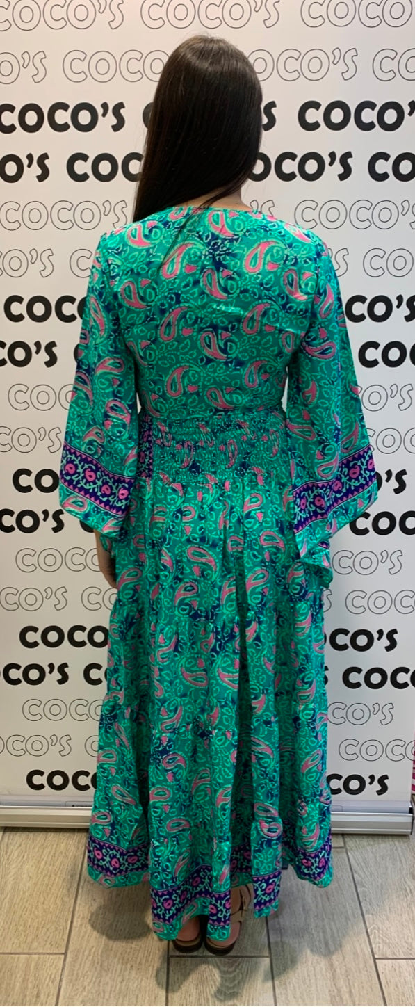 Conjunto Largo 029 Falda Verde con gotas de cachemira en fucsia.