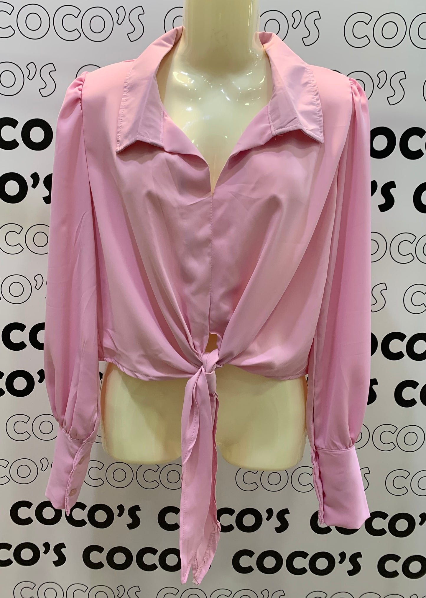 Camisa manga larga rosa.