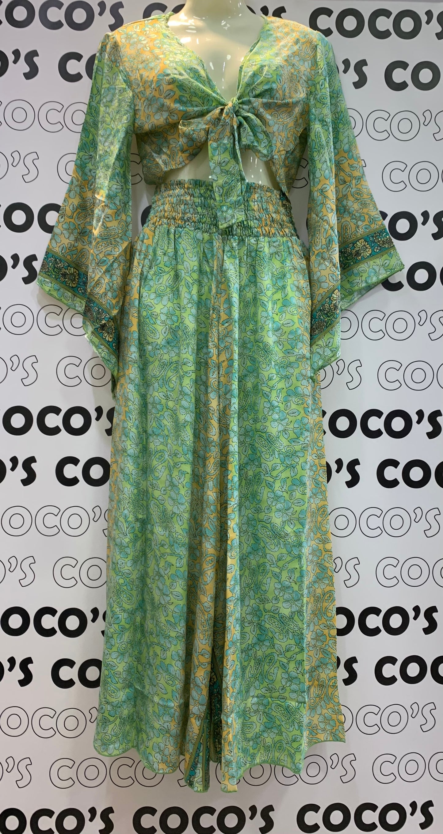 Conjunto 9020G de pantalón largo con top verde con naranja.