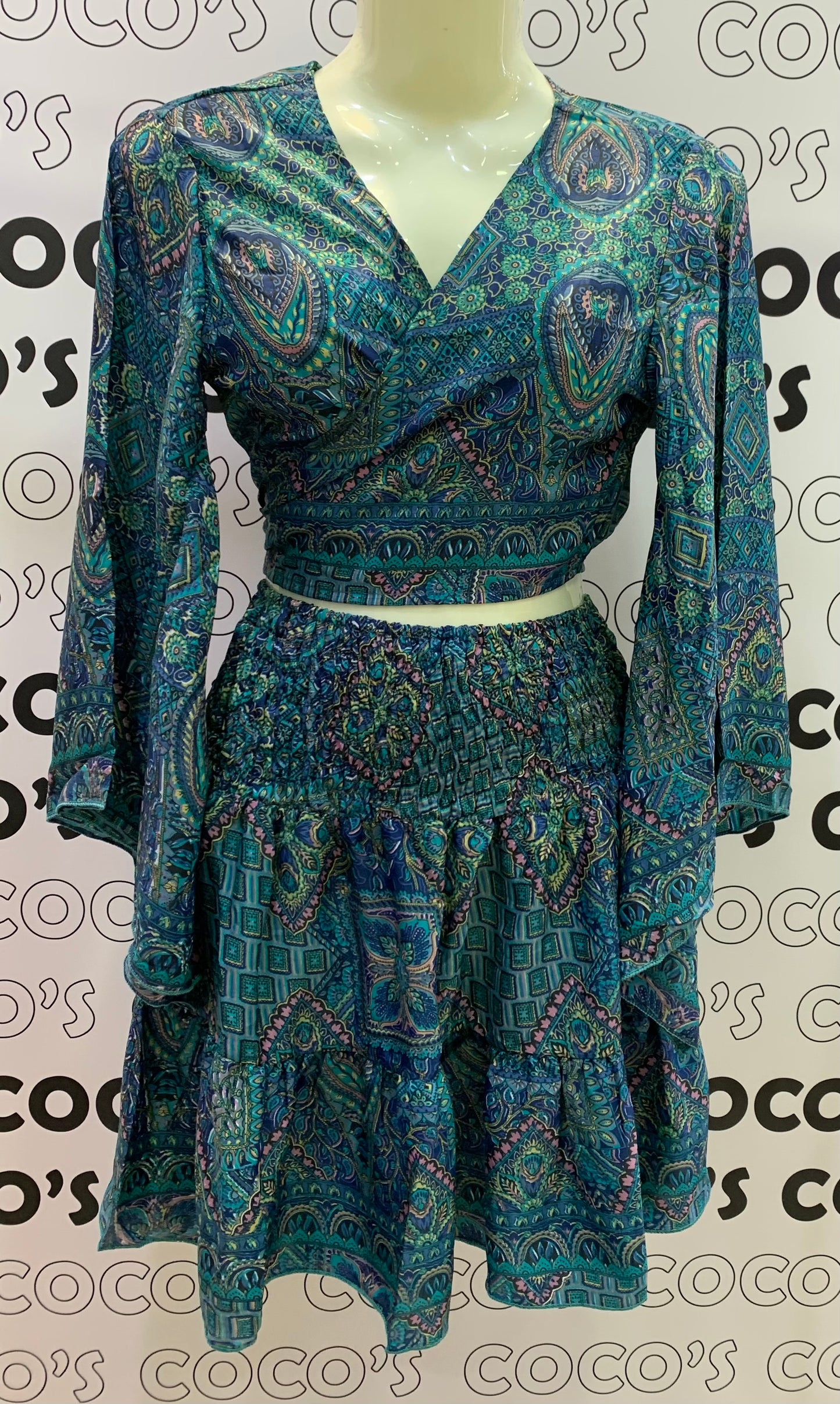 Conjunto corto 026 falda y top azul verdoso.