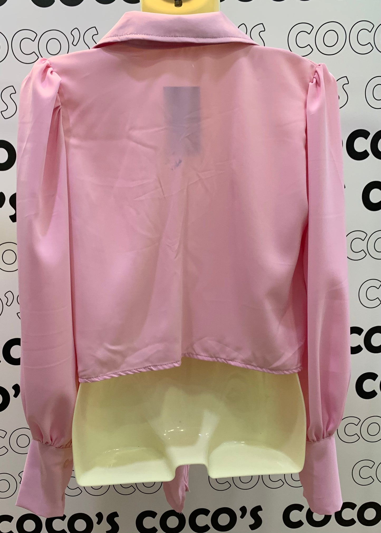 Camisa manga larga rosa.