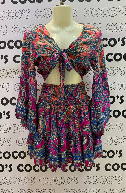 Conjunto Corto 026 Falda más top fucsia con flores azules.